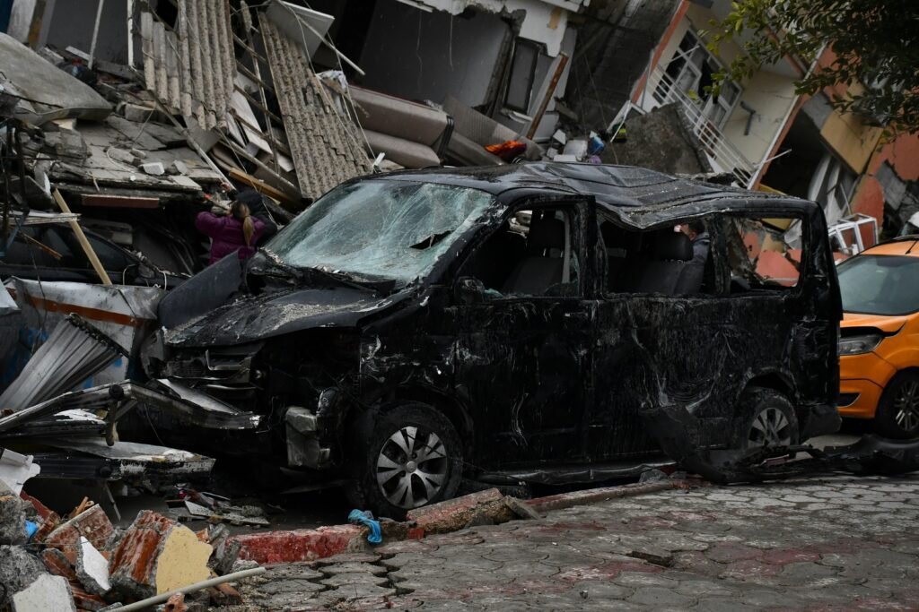 Canton Severely crushed and destroyed vehicle from catastrophic car accident surrounded by debris showing total loss damage