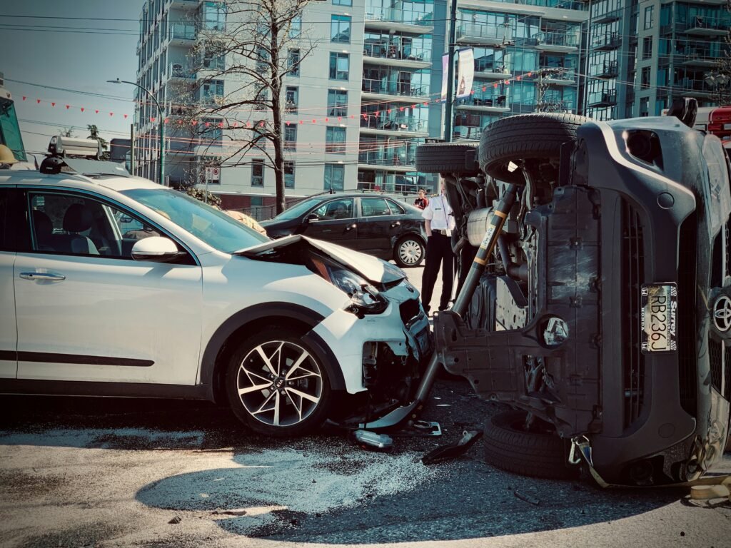 Bridgewater Multi-vehicle car accident with severe damage showing white sedan and dark truck collision in urban intersection
